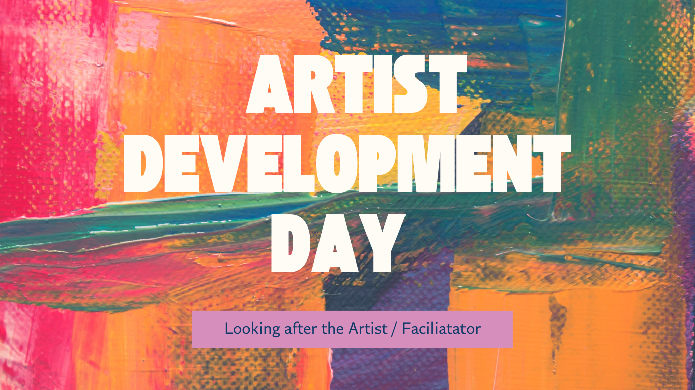  A close-up photograph of a vibrant, textured painting with bold strokes of red, orange, yellow, green, and blue acrylic paint. The words 