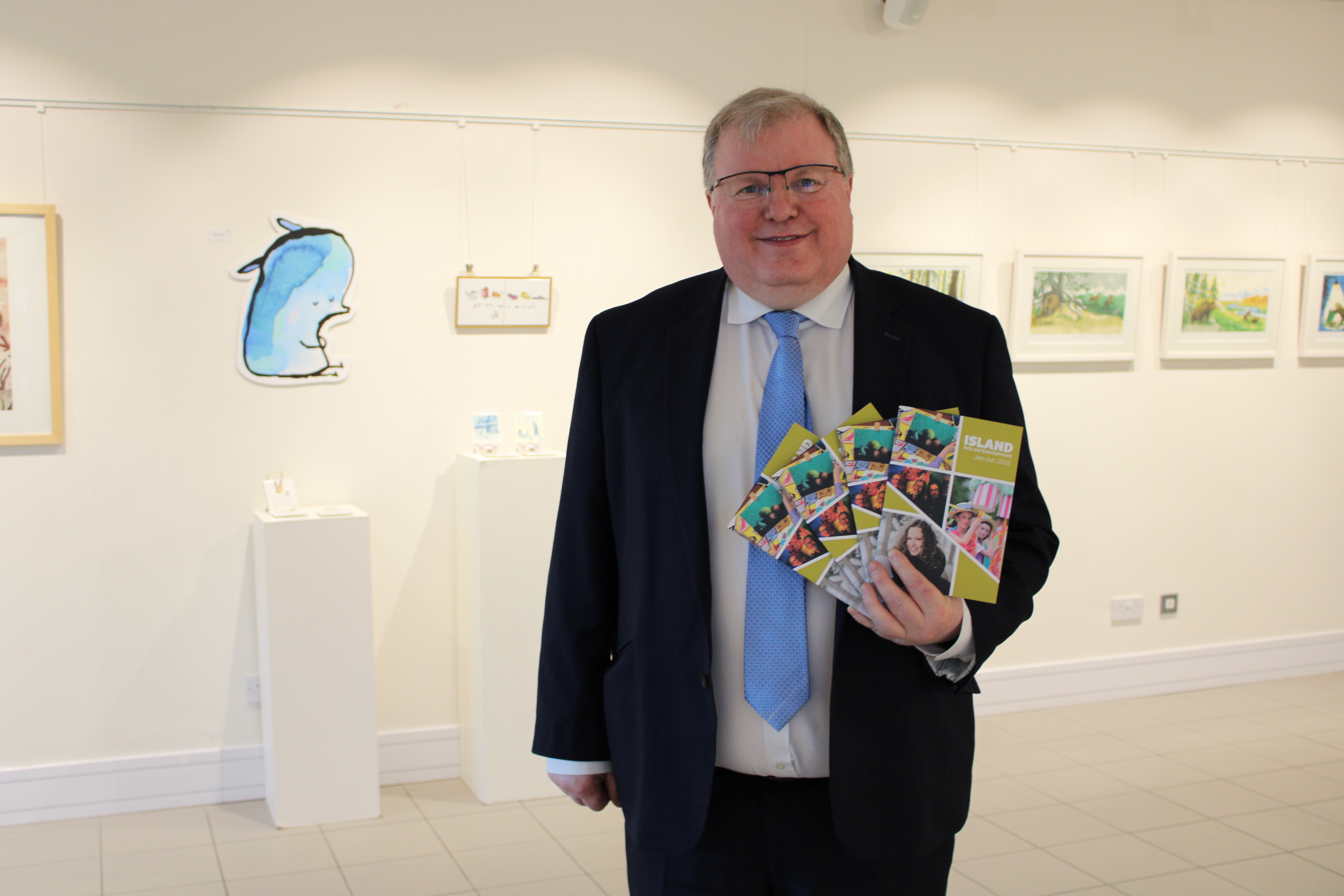 Cllr Jonathan Craig promotes our latest printed accessible ISLAND Arts & Entertainment Programme!